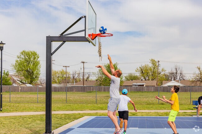 Locals enjoy playing basketball at Parmele Park.