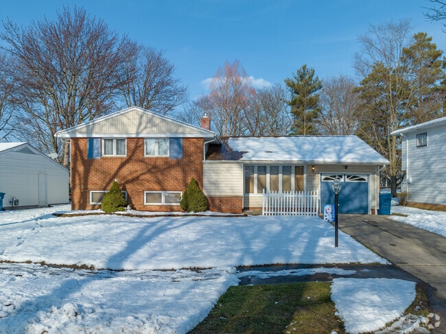 A split-level single-family home in Parma Heights, OH.
