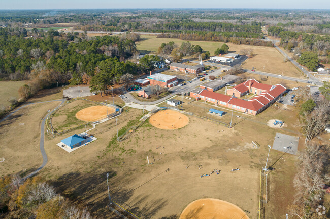 The kids at Stedman Elementary enjoy outside activities in the Cape Fear neighborhood.