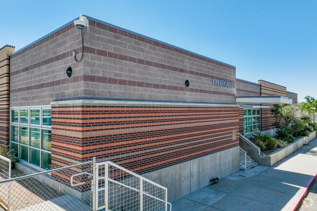 Apache Elementary Kindergarten students have their entrance in Northeast Heights, NM.