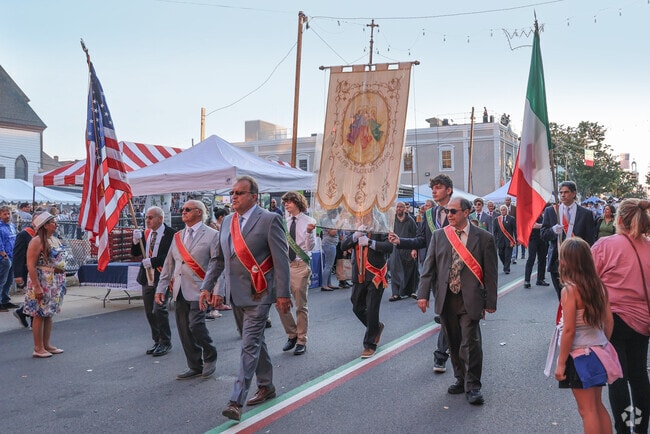 City officials join in the celebration of the Feast of Three Saints.