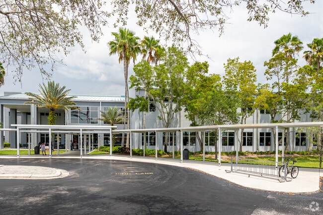 Lorenzo Walker Technical College in Naples has a circular drive with a designated drop-off area.