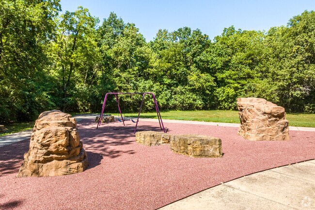 Bring your kids to Gambril Tract Park to climb the rocks and play in Royal Oaks.