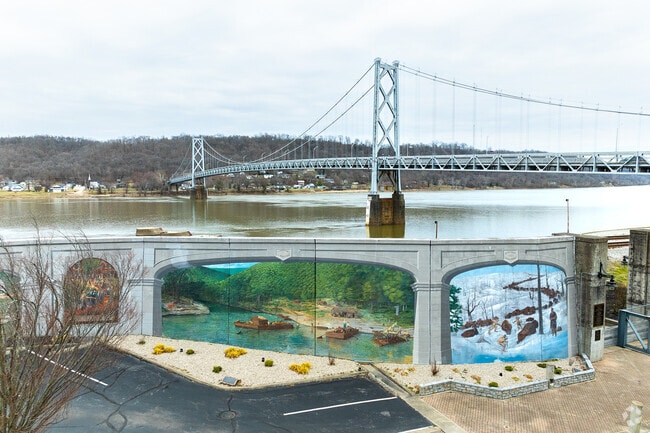 Visitors can see one of the 10 panels painted by artist Robert Dalford and his team on panels along the Ohio River floodwall in Maysville.