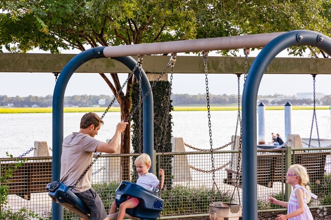 Shell Point residents enjoying a family moment at nearby Henry C. Chambers Park.