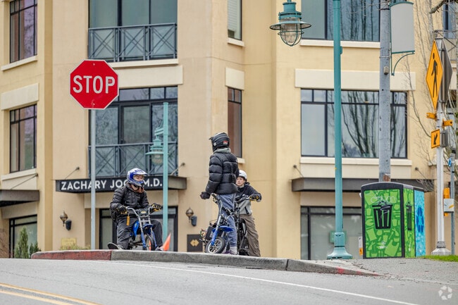 Youngsters out and about on mini bikes along Lakeshore Plaza in downtown Kirkland.