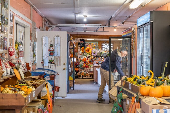 Locals purchase fresh milk and produce from Wilcox Farm in Douglass.