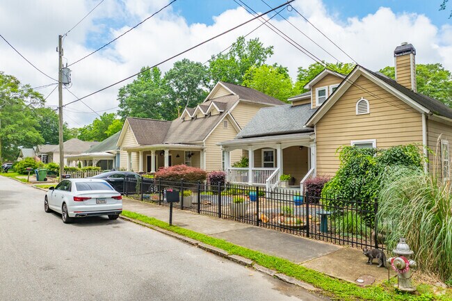 Charming early 20th-century homes line streets, reflecting the area's architectural heritage.