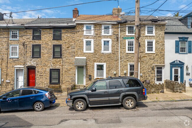Stone row homes in Manayunk sit 3 stores high and stand the test of time.
