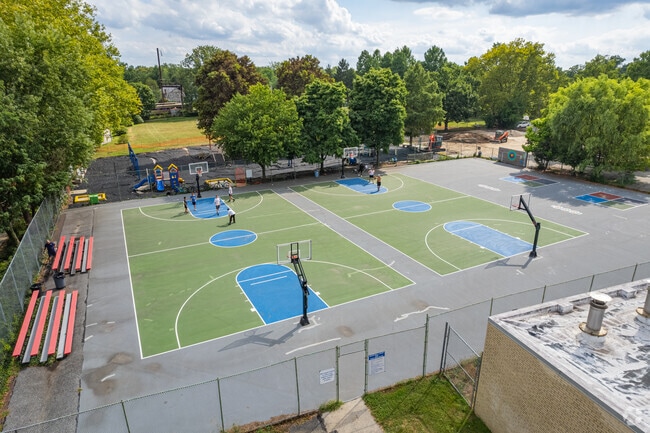View of students at Swarthmore-Rutledge School playing basketball in Swarthmore PA.
