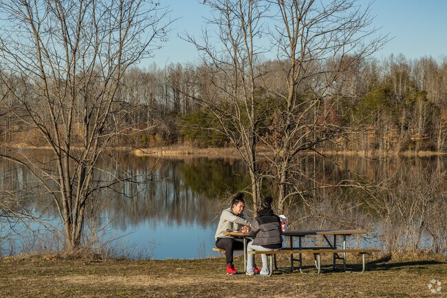 Enjoy the perfect outdoor picnic by the serene waters of Lake Mooney, a Berea favorite.