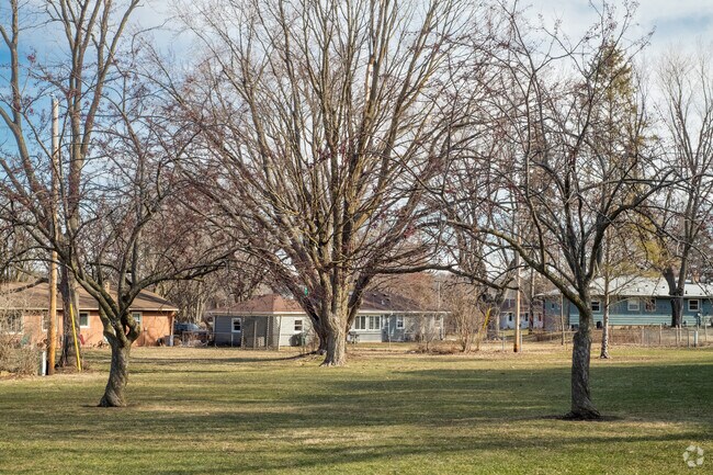 There is a green space with oak trees at Orchard Ridge Park.