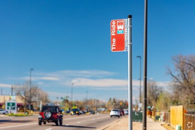Hop on The Ride busses on the west side of Highline Villages on S Havana Street.