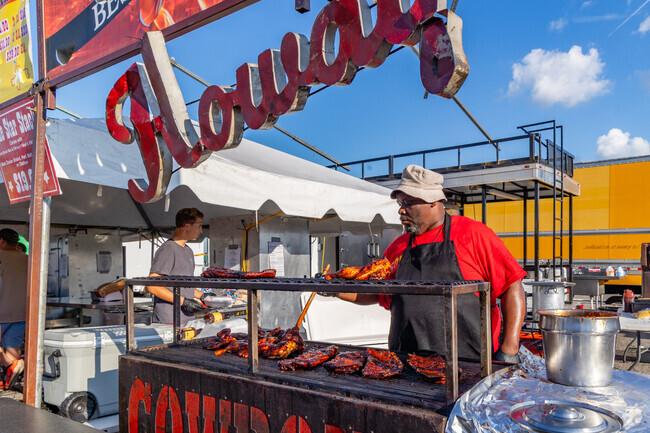 You can get up close and personal to the barbeque cooks at BBQ on the River.