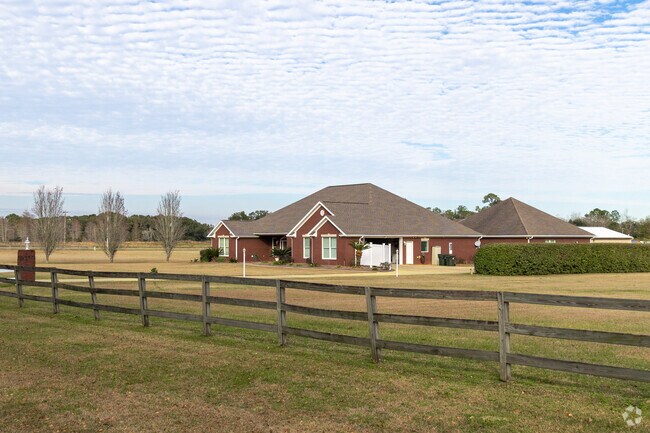 Experience the charm of well established homes on large lots on Summerdale.