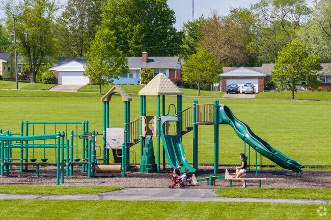 Jacot Park, near Euclid Heights-Runnymede, features a playground, soccer fields, and paved trails.