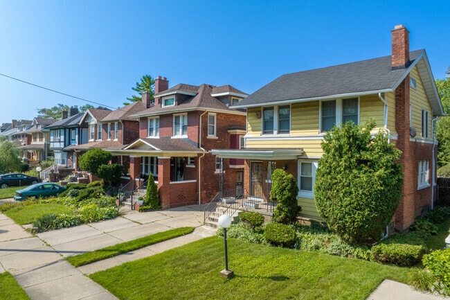 A row of bungalows and colonials lines the quiet streets of the Virginia Park Community.