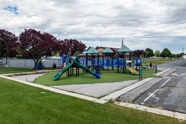 Arcadia Elementary School’s playground is enjoyed by a family after hours.