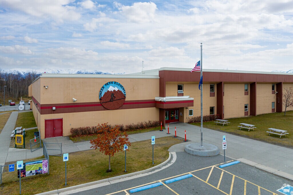 Pioneer Peak Elementary has above average test scores according to Greatschools.