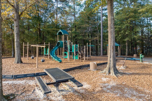 Walnut Lane Neighborhood Park sits between St Julian Place and Mill Branch Way.