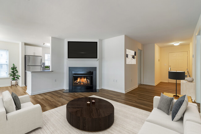 Renovated Package II living area with hard surface plank flooring