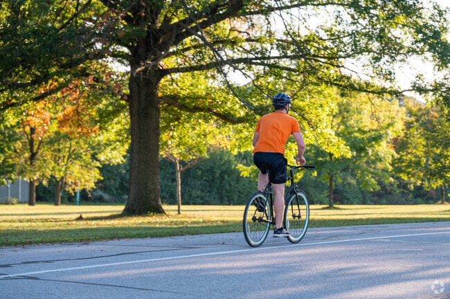 This cyclist enjoys one of the many trails at Fort Wayne's Shoaff Park.