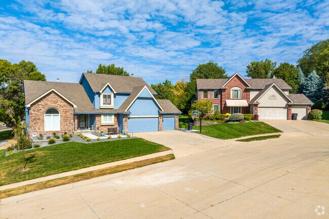 Large homes on cul-de-sacs feature beautiful landscaping and private yards.