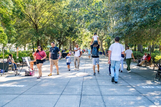 Families gather at Forsyth Park for a day of fun in nature.