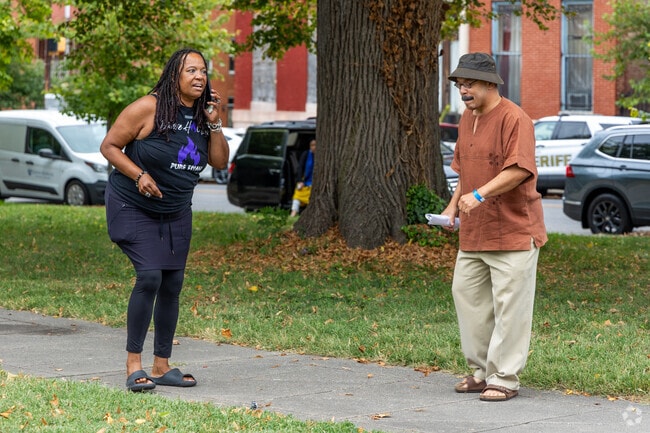 Harlem Park residents dance to the music of Billie Holiday at Jazz in the Square.