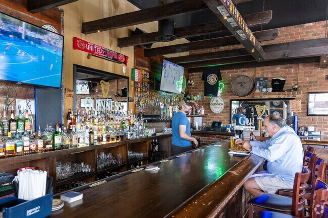 The Celtic Monkey Irish Pub offers dining near Sea Breeze.