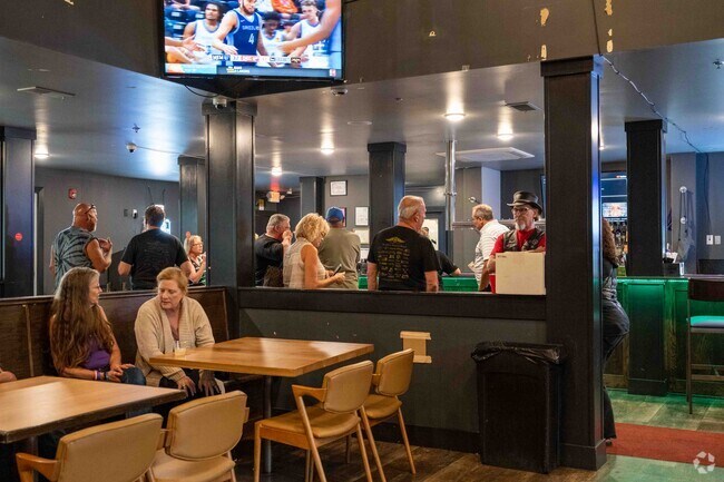 The Park Bar and Grill in Parkland Ridge has outdoor seating with delicious food and cocktails.