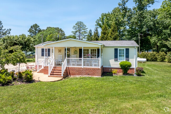Homes like this small ranch home with a spacious green-grass yard tend to go for under $200,000 in Dillwyn.