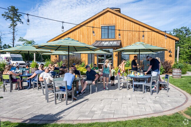 Savor farm fresh delights and craft brews at Tilted Barn Brewery's vibrant Summer Fest, Exeter.