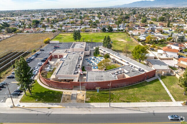 Eric Birch High School presents an aerial view, showcasing its vibrant environment.