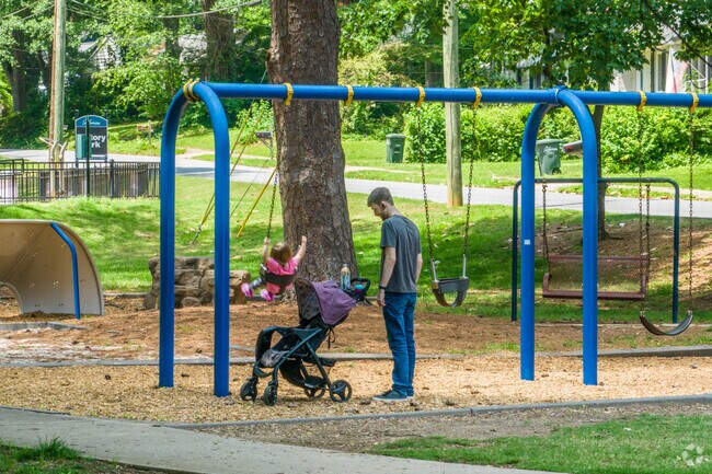 Victory Park features playgrounds and shaded benches that offer a safe and fun environment for children and parents to gather and play.