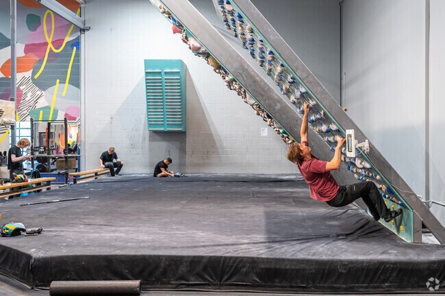 Bouldering Project offers indoor climbing, yoga, and strength training near the riverfront.