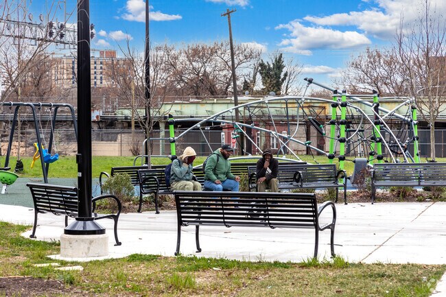 Sitting at Fotterall Square Park talking with friends.