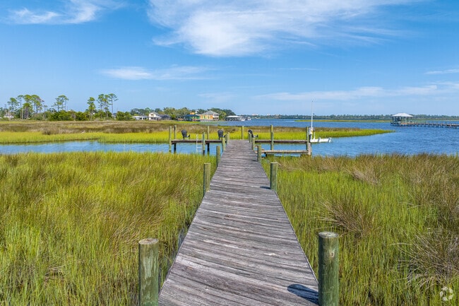 Enjoy a walk on your own private dock to fish or sit by the water in Isle of Palms.