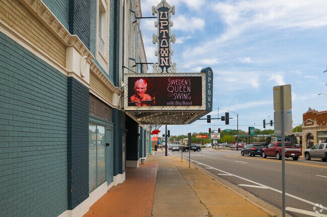 Residents watch their favorite show at East Front/Sunnyside’s Uptown Theater.