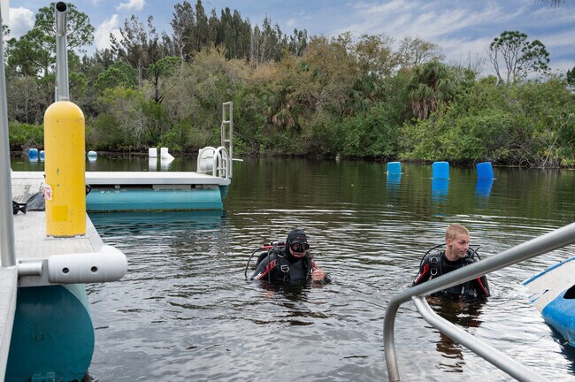 Scuba divers pulling up unique finds at Hudson Grotto.