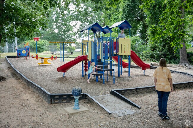 Children enjoy going to the playground at the Robbins Greenspace in the area.