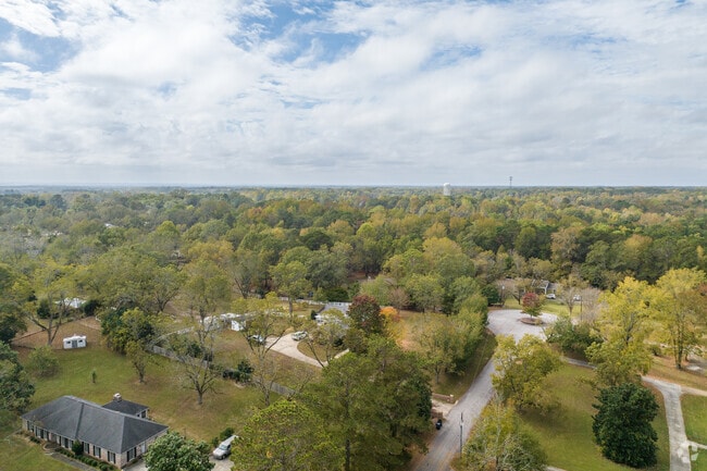 Willow Creek offers quiet living away from downtown with essential amenities nearby.