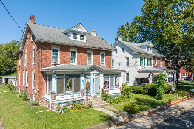 One-hundred-year-old American Foursquare homes stand proudly in West Rockhill.