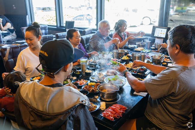 Enjoy endless Korean BBQ and hot pot at Q Pot, a must-visit in Dove Hill for food lovers.