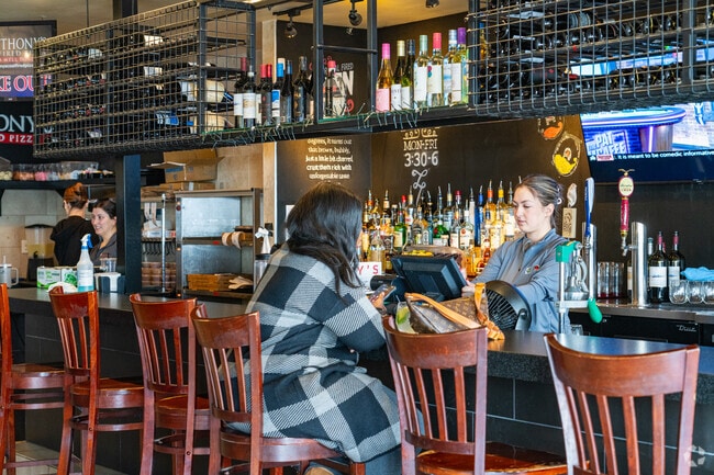 Anthony's Coal Fired Pizza and Wings features a full bar in Pike Creek.