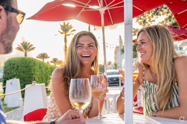 Unwind with a glass of wine at NEAT, a chic gathering place in Alys Beach.