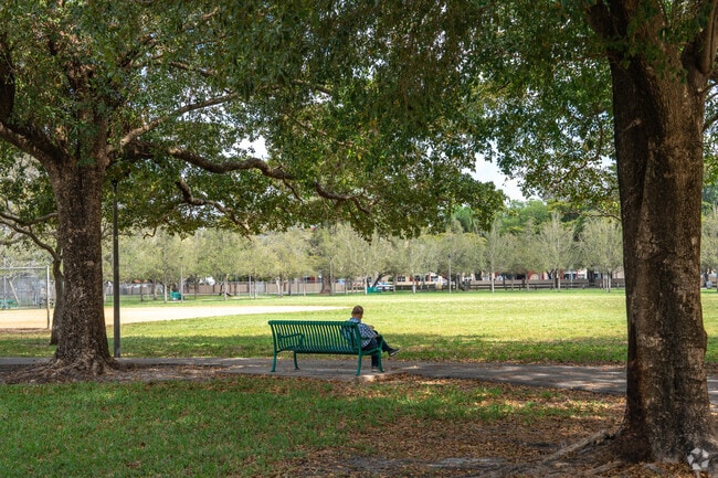 International Gardens Park is the perfect place to read a book in the shade.