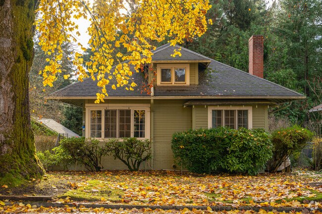 Vibrant fall colors frame a Craftsman Bungalow in Sherwood, OR.