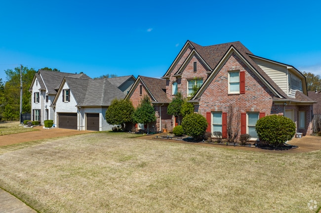 Many homes in Cordova feature sharp roofs and brick facades.