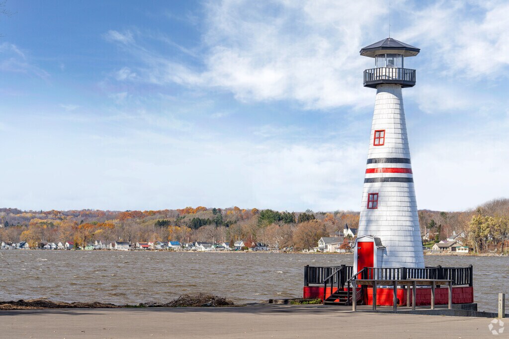 The Celoron Lighthouse shines over the Chautauqua Lake.